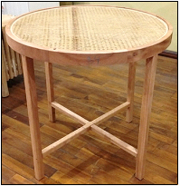 round table w rattan skin webbing